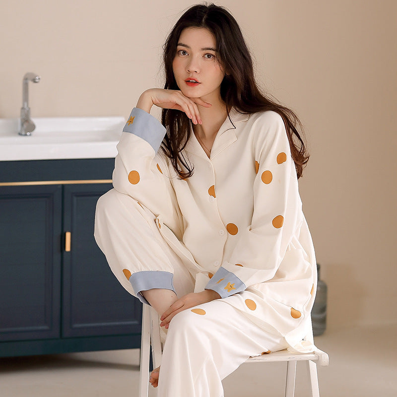 Polka Dot Cardigan button-down cardigan top with lapel collar blue accent cuffs, elastic waist bottoms with blue accent ankles. Cozy comfort women's pajamas, ladies pajamas, loungewear